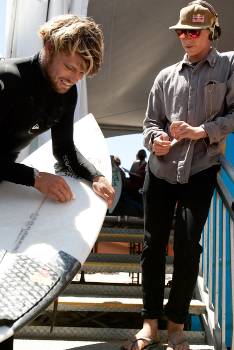 Dane Reynolds and Kolohe Andino A Karate kid moment. Sensei Dane Reynolds teaches Kolohe Andino: wax the board.