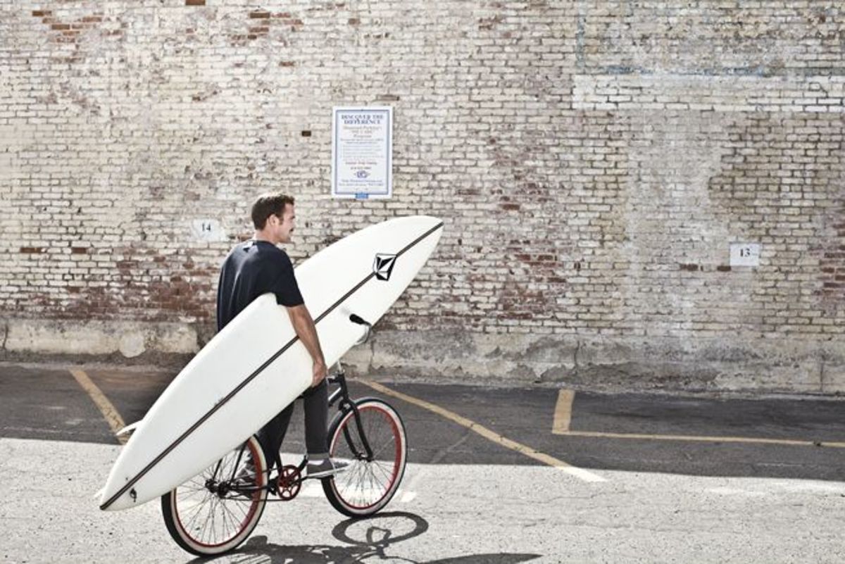 Derek Dunfee with Pat Curren Surfboard Derek Dunfee and big-wave surfboard