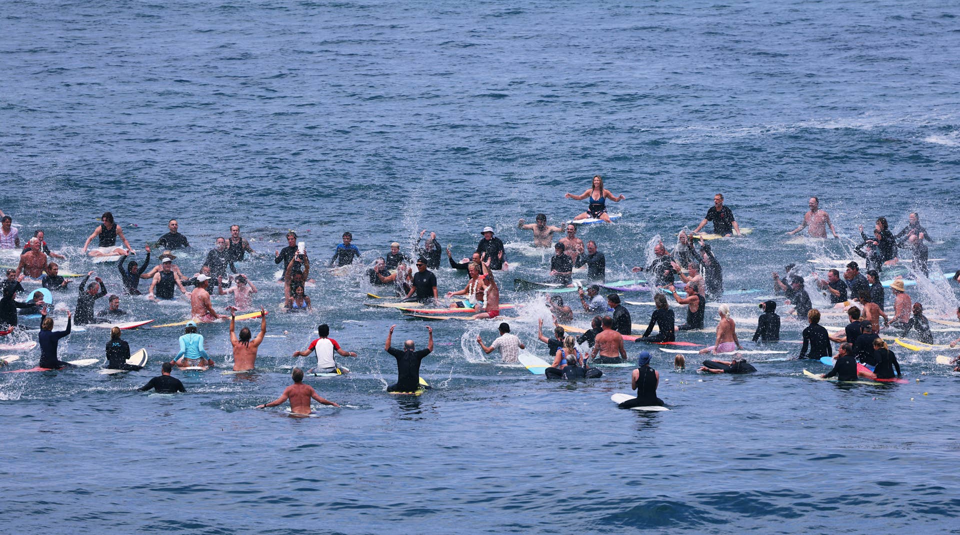 Paddle Out For Mike Hynson Draws Hundreds of Surfers - Surfer