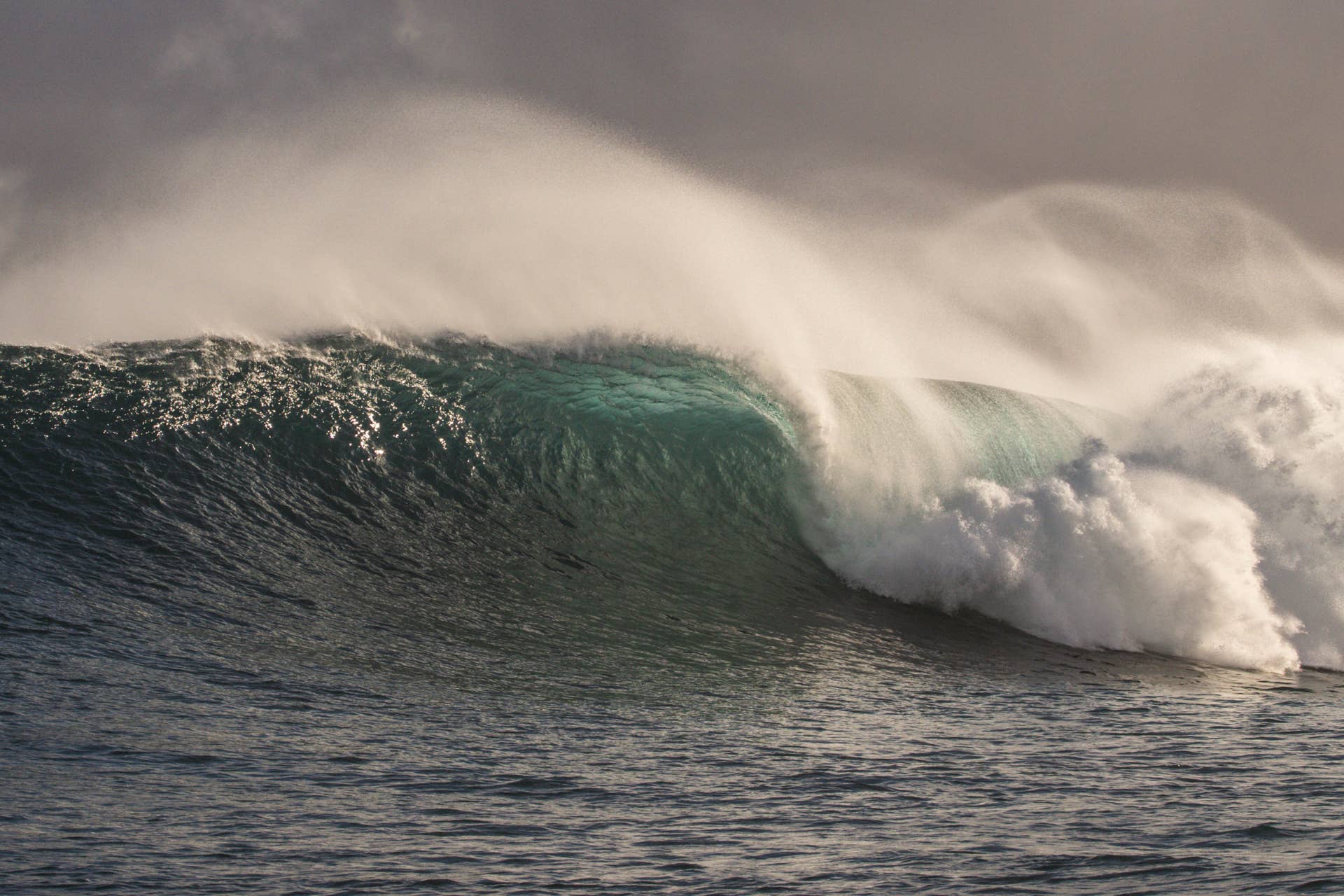 Surfer looking at ocean
