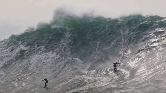 Watch A Crew of Pros Surf Big and Gnarly Novelty Wave at Huge
