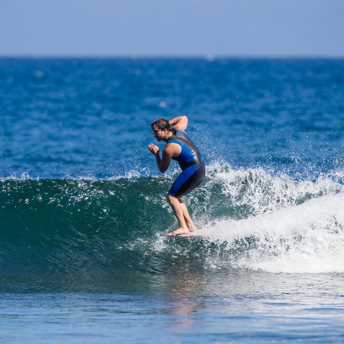 A Visitor's Guide to Longboarding Malibu - Surfer