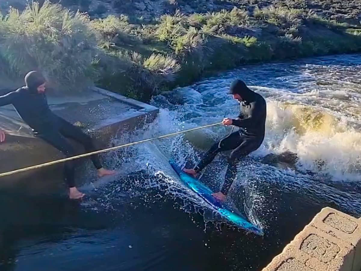 River wave surfing hot sale