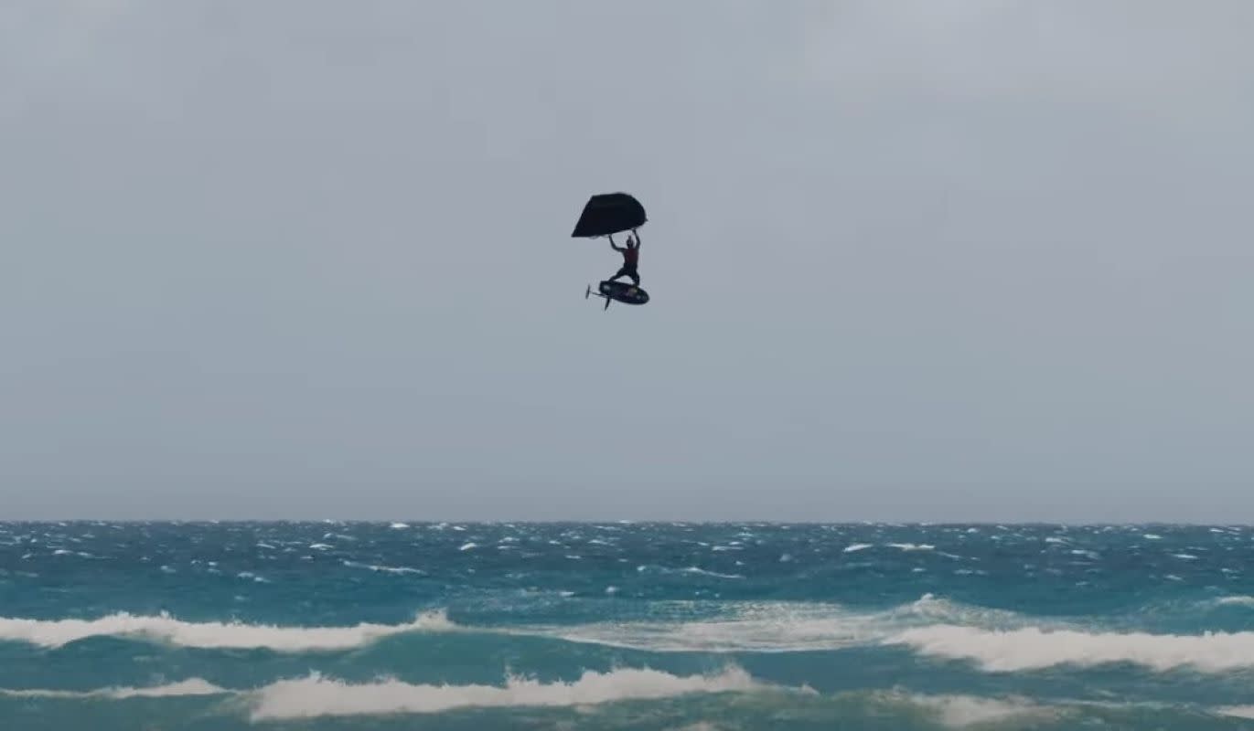 Watch Kai Lenny Launch Over 40 Feet in the Air Wing Foiling Clip