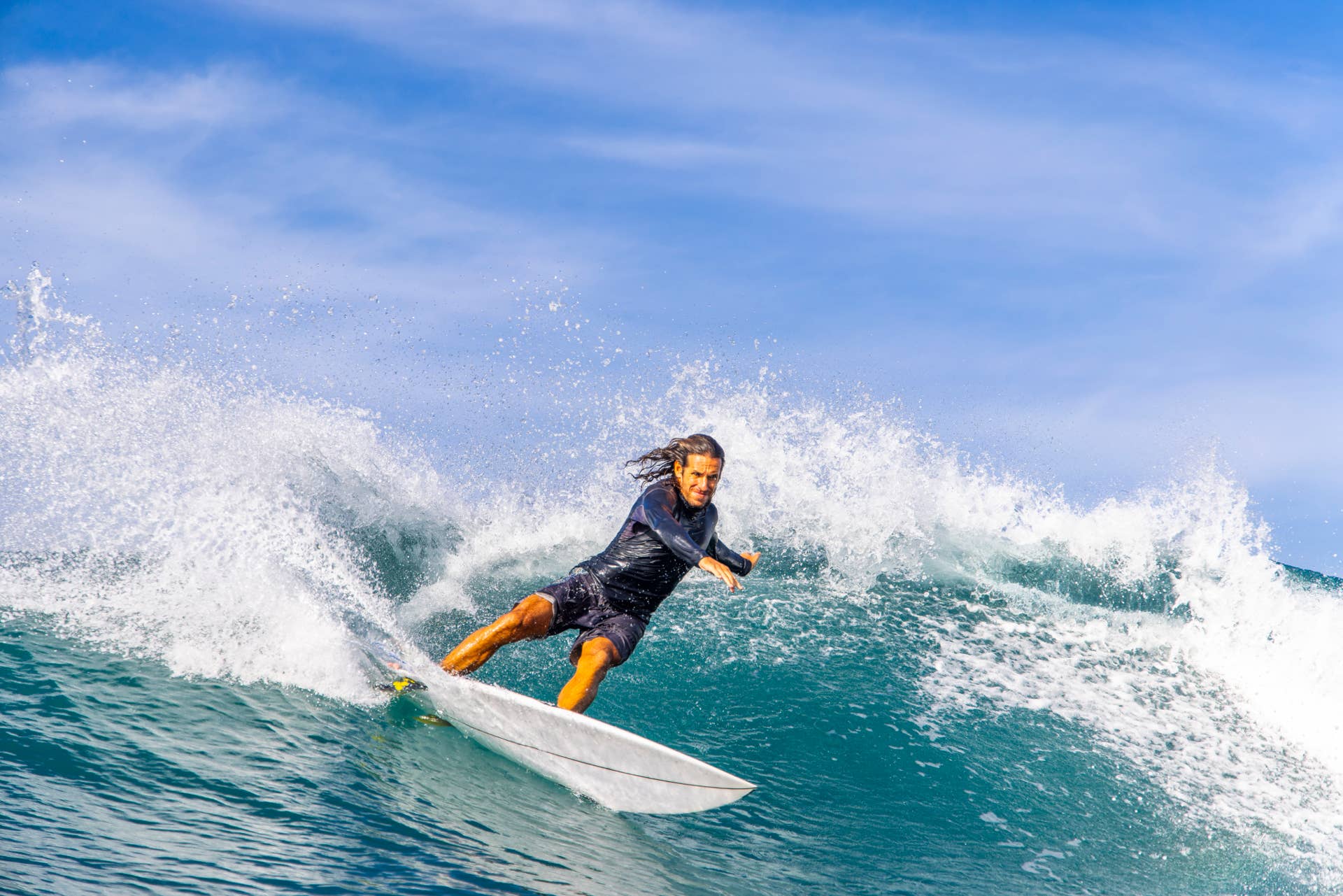 Surfer demonstrating technique