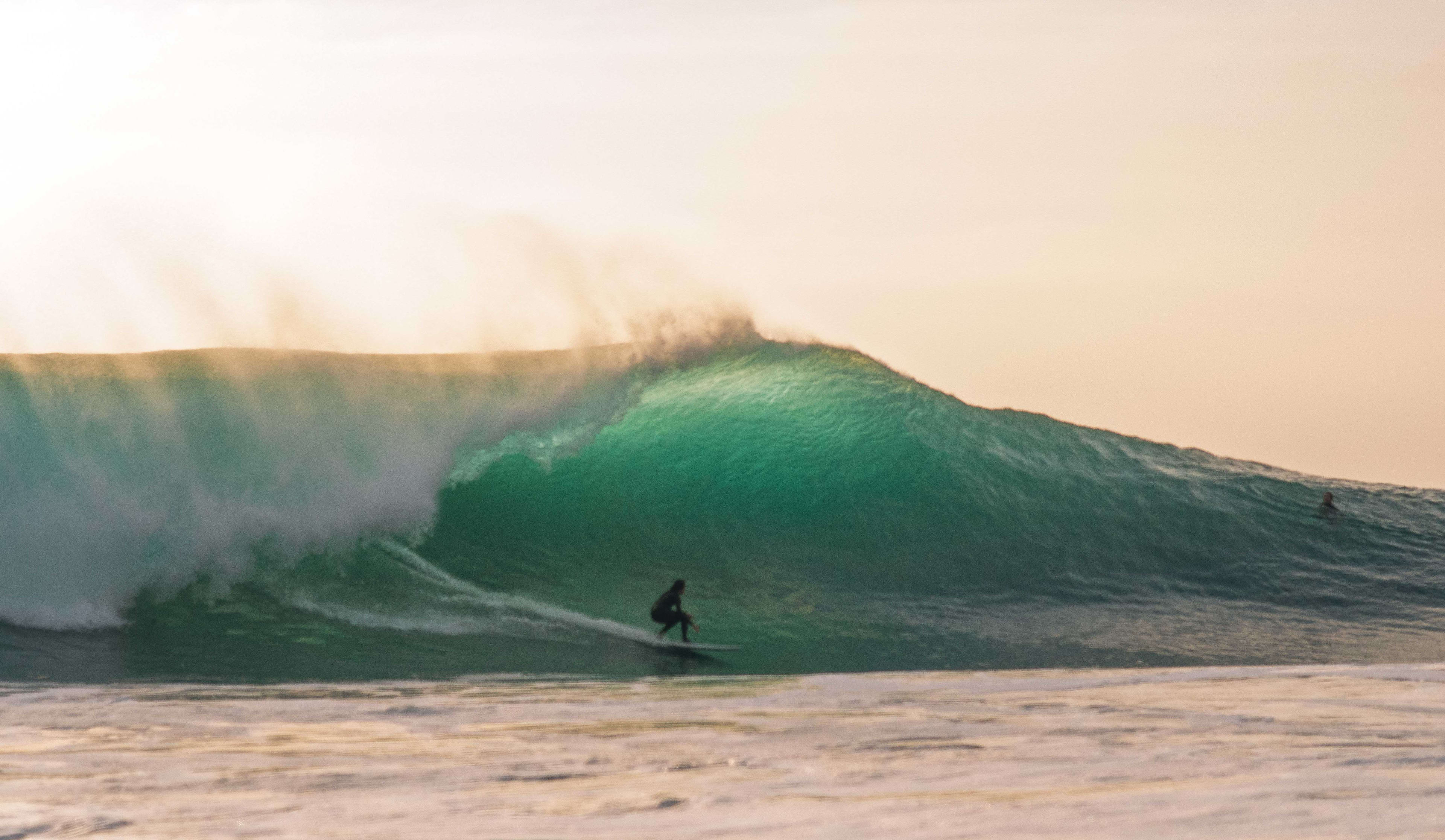 Surfing 2 foot waves on sale