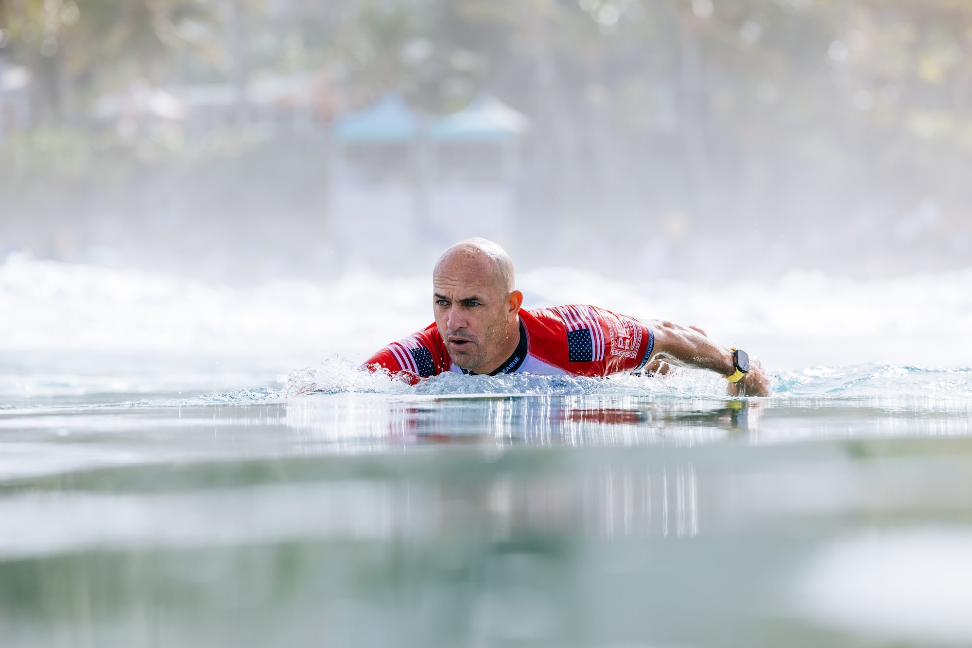 Face the Shark!': Kelly Slater Shares Surprising Survival Tip - Surfer