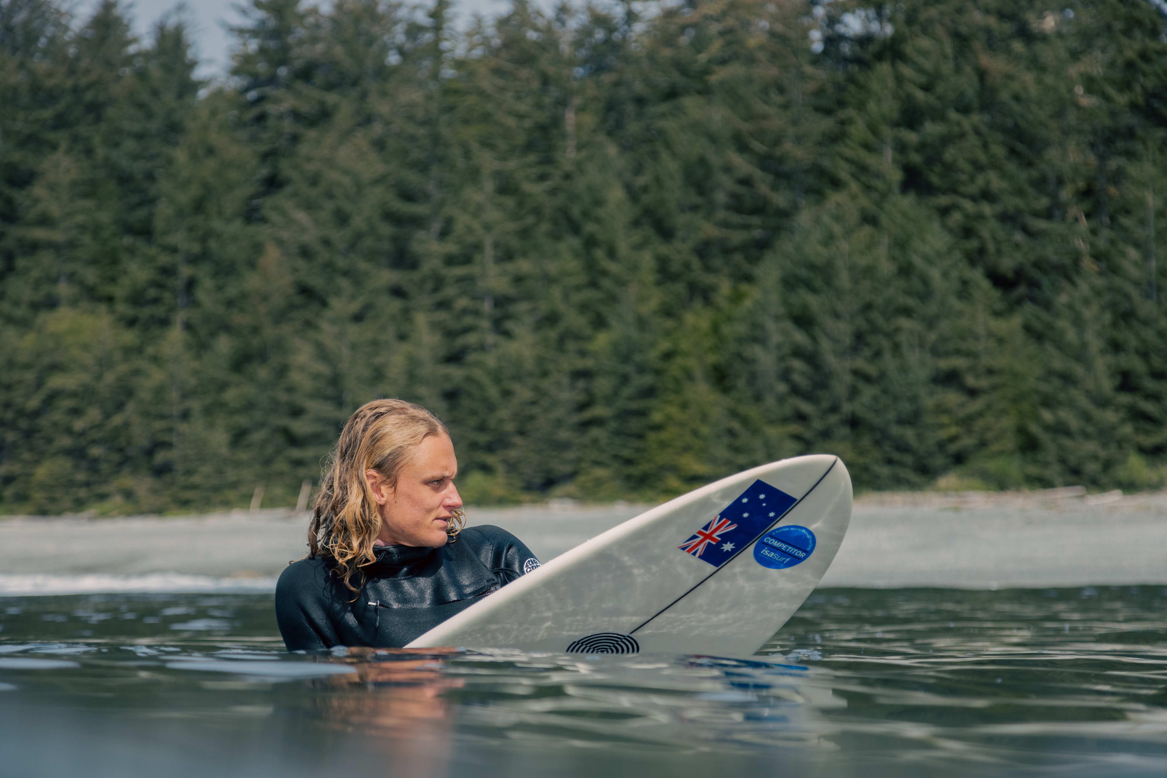 Kai Colless checking the shore for black bears.